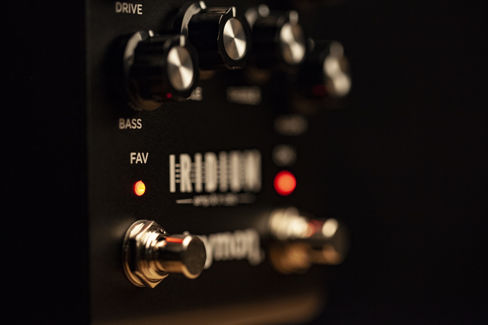 Close up shot of Strymon Iridium's FAV footswitch.