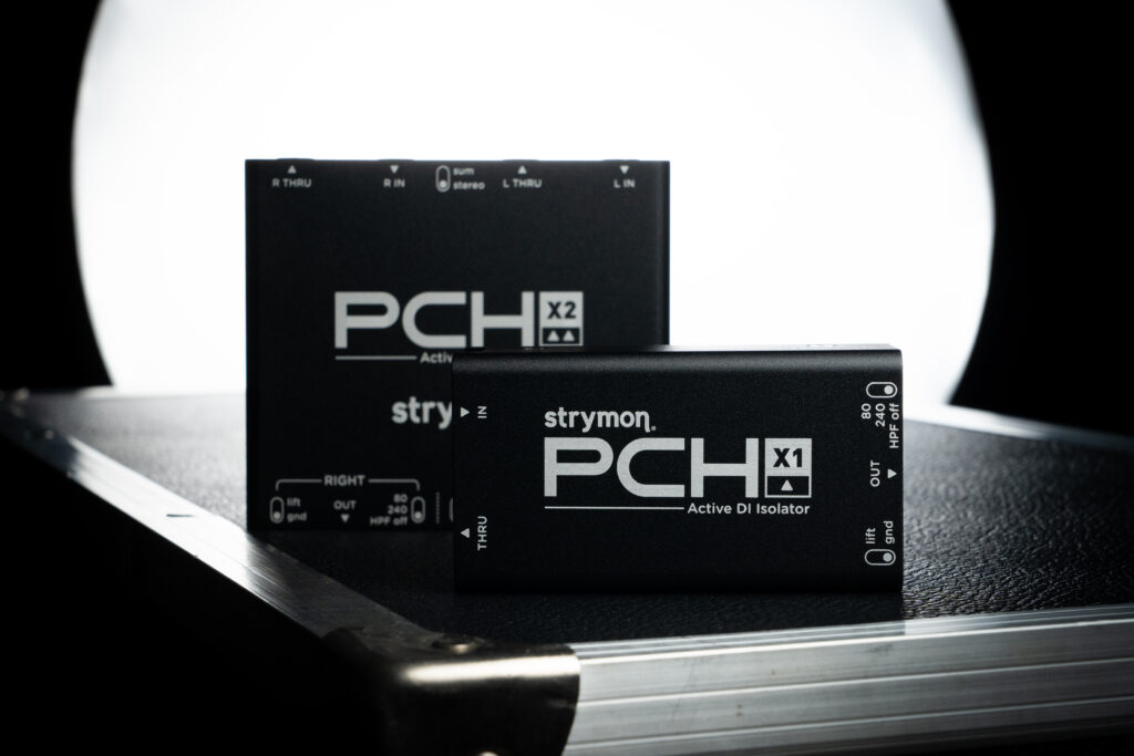 PCH X2 and X1 on top of a black road case. White light behind it.